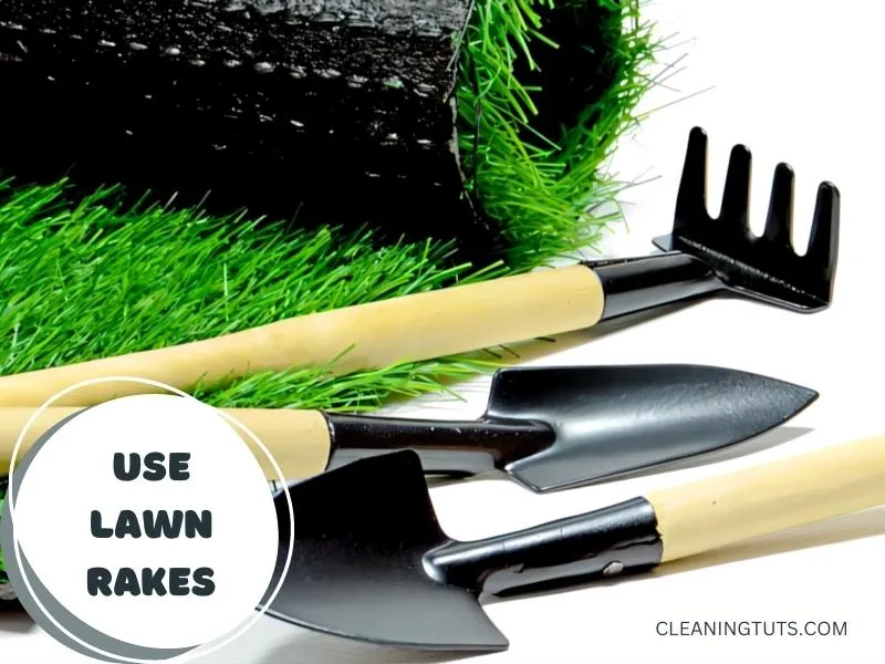 Lawn rake and other tools for cleaning artificial grass