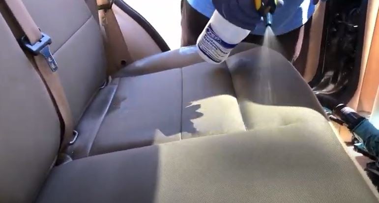 Apply the cleaning liquid on Ford Seat