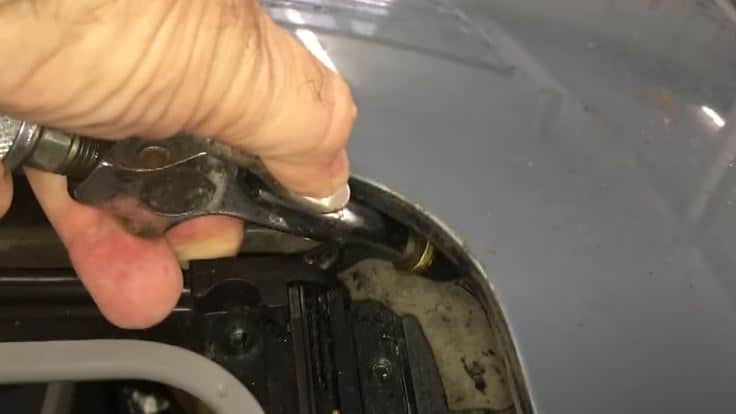 Blow Compressed Air Through the Drain Hole