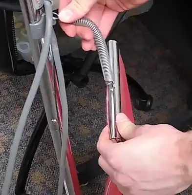 second step of emptying a vacuum cleaner