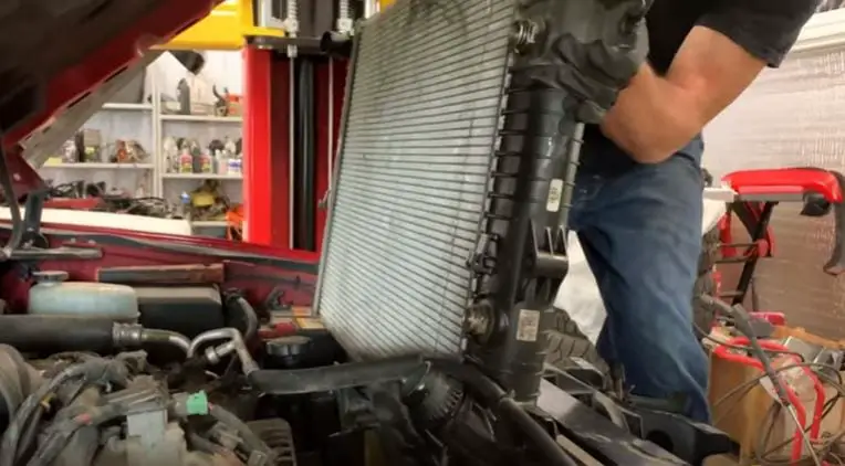 remove auxiliary parts to clean cooling stack on duramax