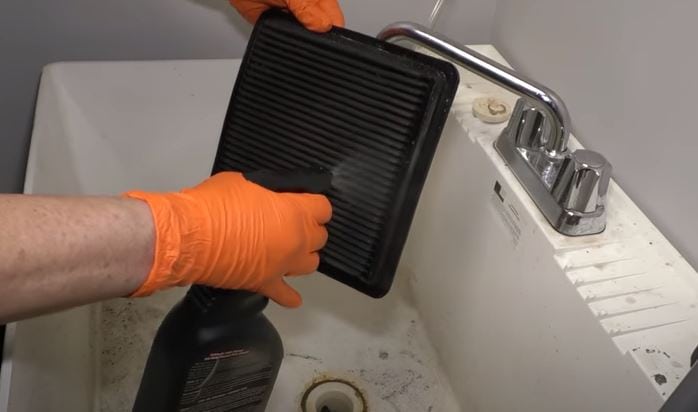Spray an All-purpose Cleaner onto the Air Filter