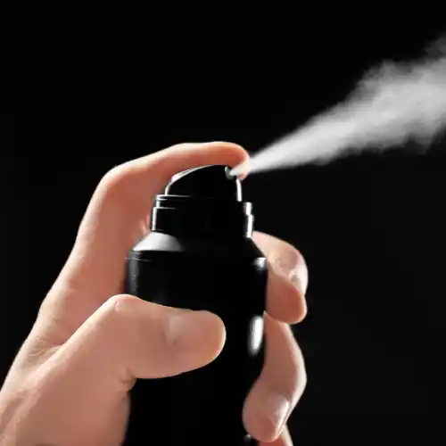 Using odor remover spray
