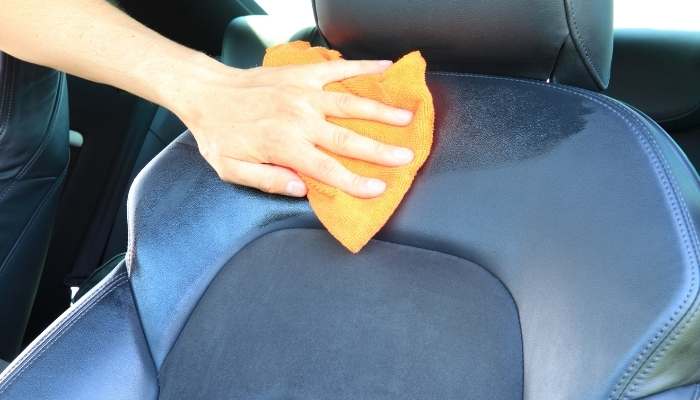 Wipe the Car Seat Surfaces with a Microfiber Towel